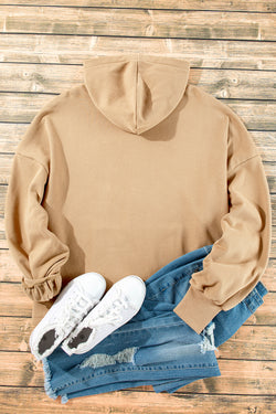 Loose-fitting half-zip hoodie with parchment fleece-lined kangaroo pockets