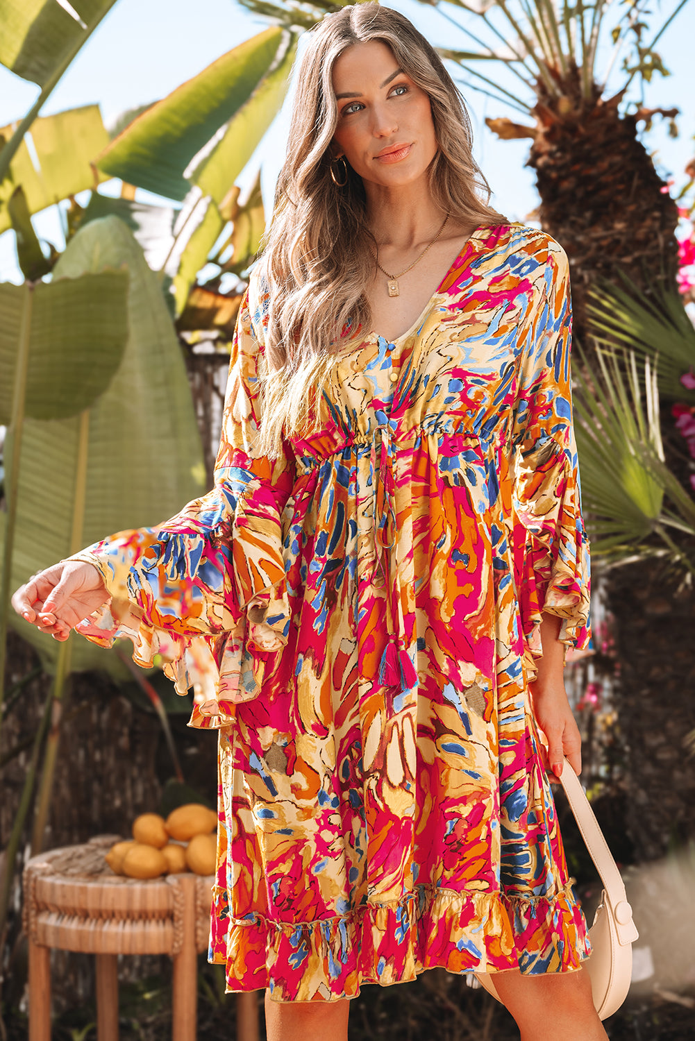 Pink fluid dress with flared sleeves *