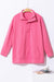 Hot pink textured sweatshirt with zip neck and kangaroo pocket