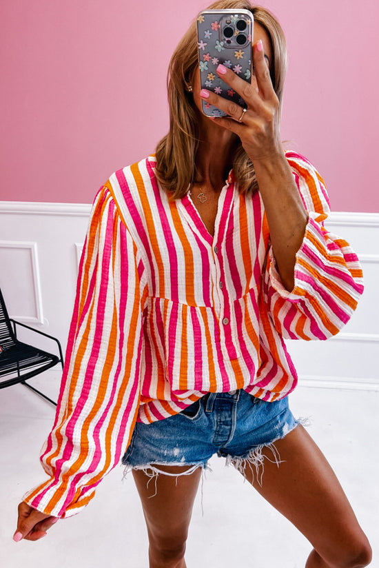 Orange striped blouse, balloon sleeves, notched v collar, buttoned on the front