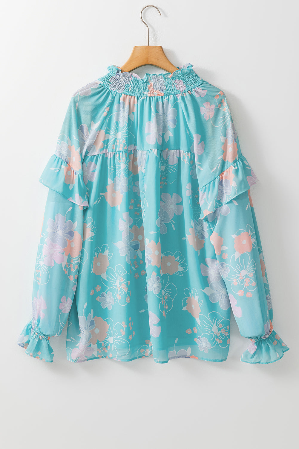 Blouse à manches bouffées à cou de cou floral bleu ciel