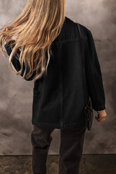 Black denim jacket with side pockets and lapel collar