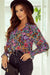 Multicolored V -collar blouse and long sleeves with ruffles and floral print