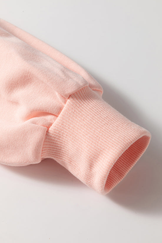 Sudadera de albaricoque rosa de gran tamaño con brillo y nudo de mariposa caída