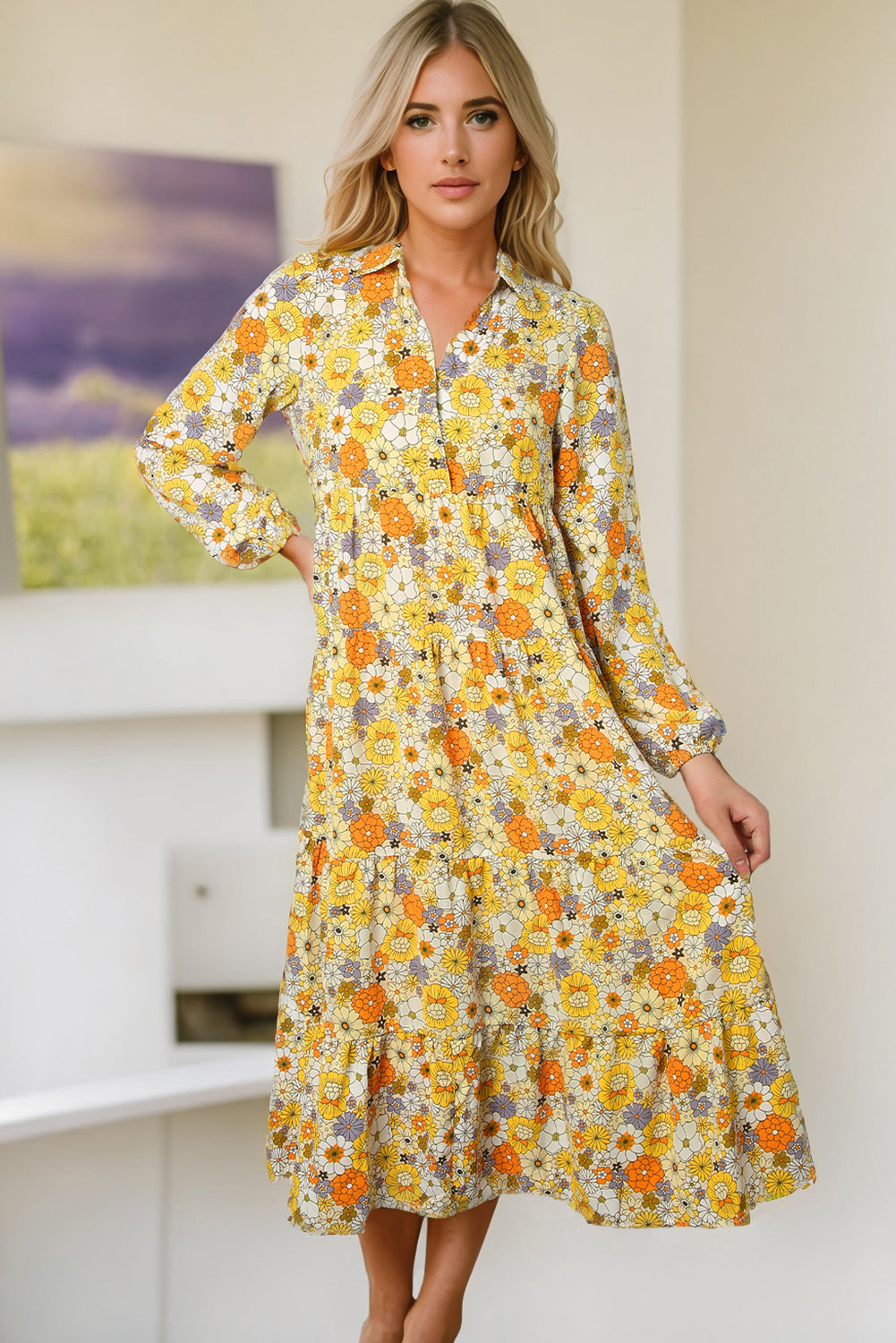 Yellow ruffled dress with long sleeves and floral collar in bohemian style