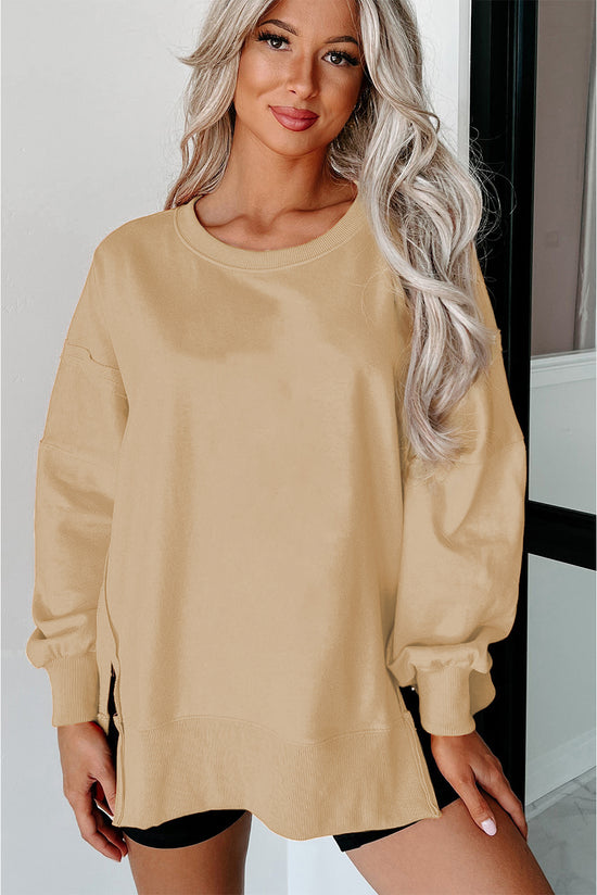 Light French beige beige sweatshirt, drooping shoulders, round neck and slits