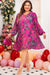 Pink pleated dress with large abstract floral print