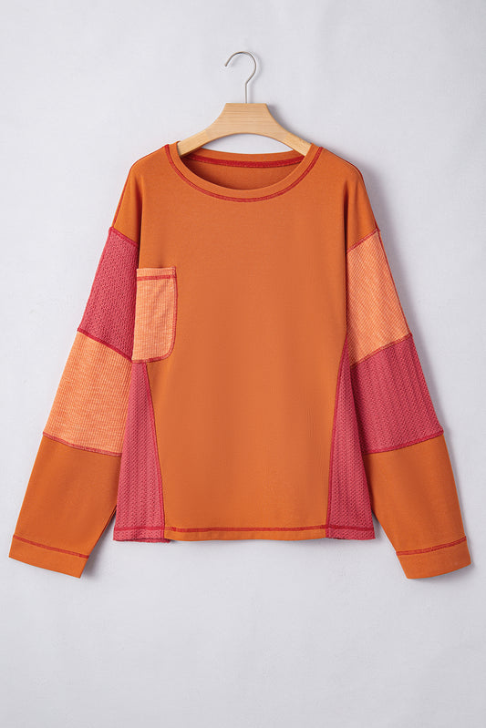 Haut orange en tricot texturé avec bloc de couleurs *