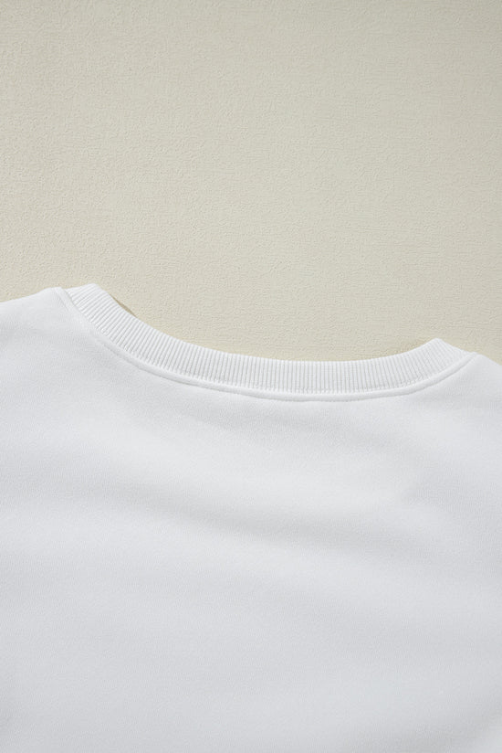 United white sweatshirt with puffy sleeves and round neck