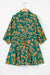 Short fluid dress tunic with green floral print tightening