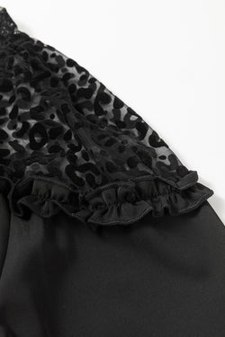 Long sleeve and ruffled blouse in black leopard mesh