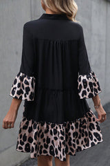 Robe courbée noire à volants et col fendu en patchwork léopard