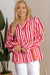 Orange striped blouse, balloon sleeves, notched v collar, buttoned on the front