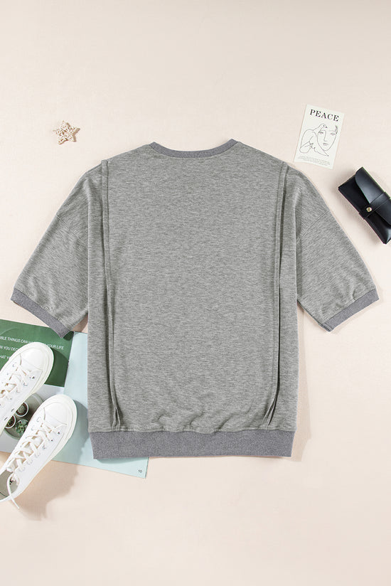 T-shirt ample fendu avec poche poitrine et coutures apparentes gris clair