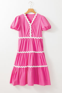 Mid-length fluid dress with short puffing sleeves and candy ric rac border