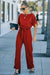 Bright red belted wide leg jumpsuit