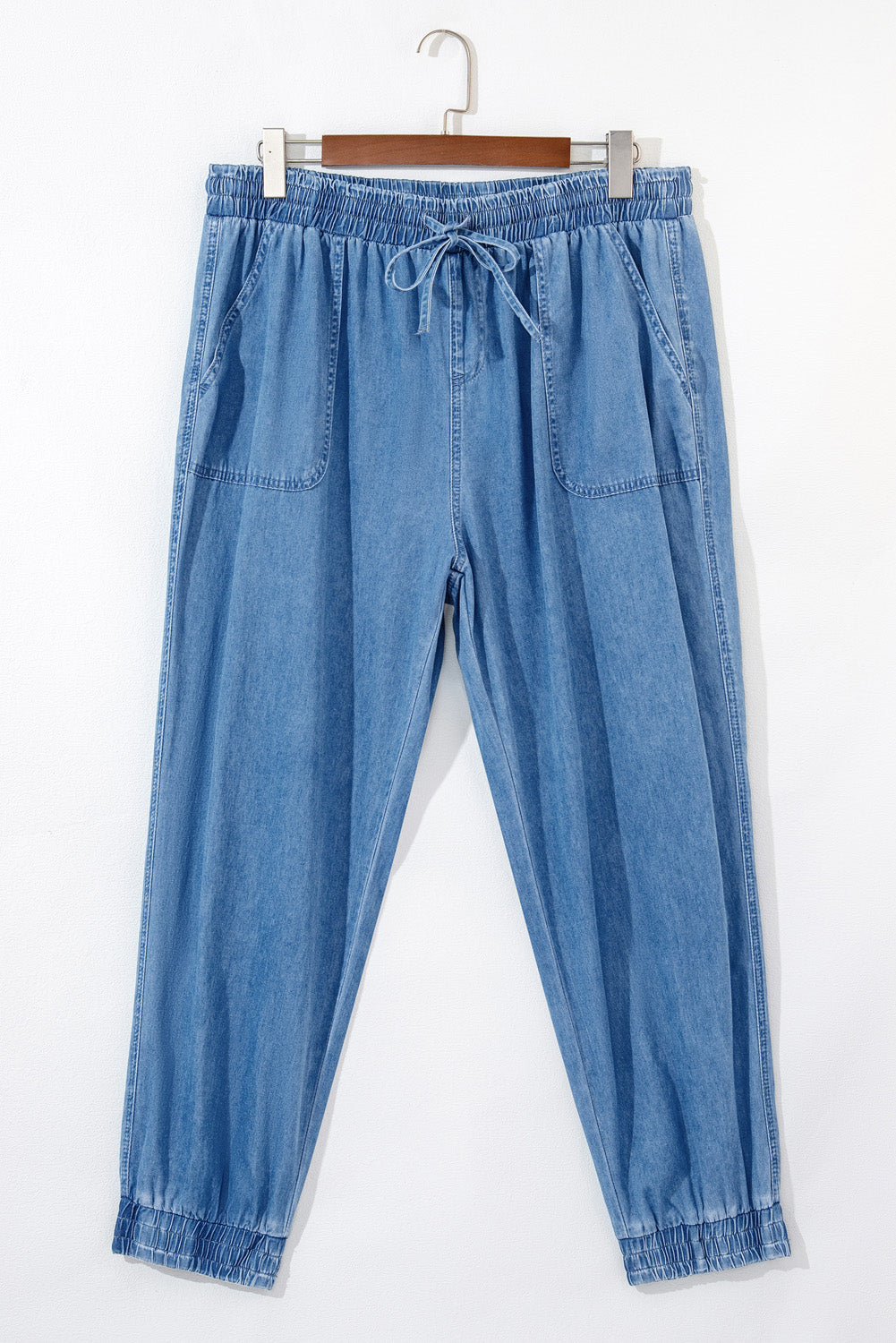 Dusk Blue Denim Jogger Pants with Waist Pockets and Oversized Drawstring