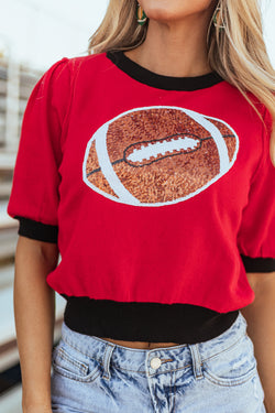 Short -shaped sleeve sweater in red sequins rugby color blocks