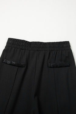 Pantalones de cintura grande y mosaicos en encaje bohemio negro *