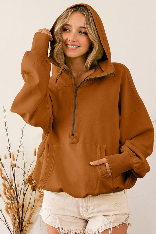 Brown zip-up hoodie with kangaroo pocket and ribbed trim