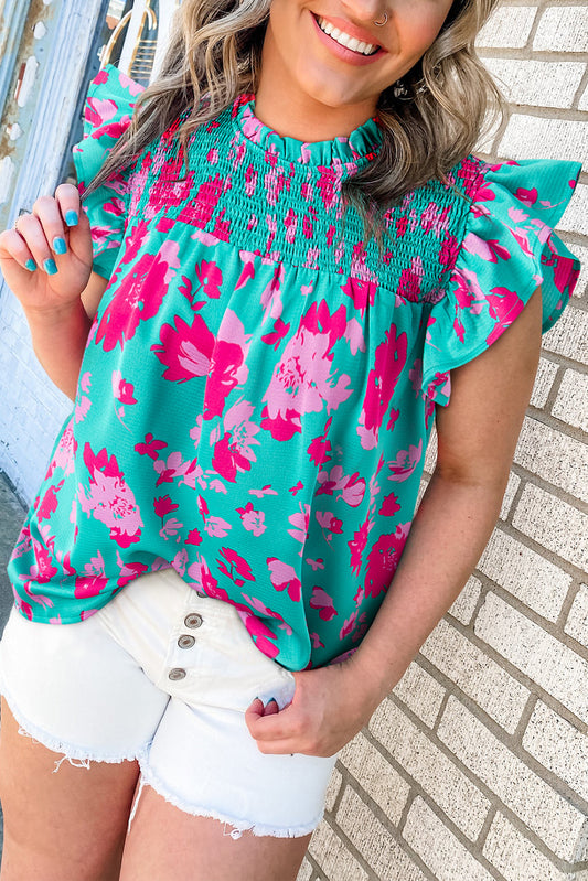 Blouse froncée à manches flottantes et à volants fleuris vert