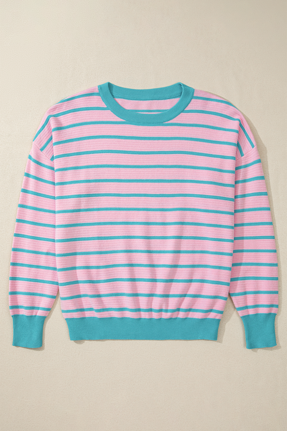 Loose sweater with pink stripes and round neck, dropped shoulders