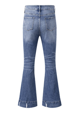 Lightly distressed sky blue flared jeans with a medium wash