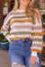 Blot knitted sweater hollowed out with multicolored stripes