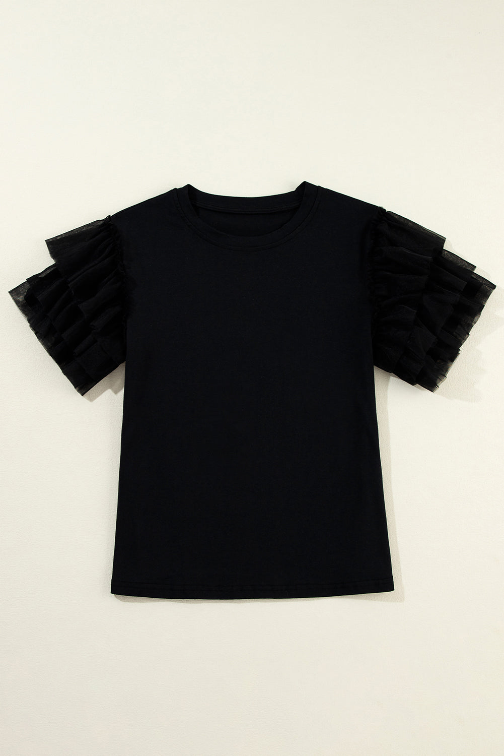 Blouse noire à manches volantées en tulle-A WOMAN WE LOVE