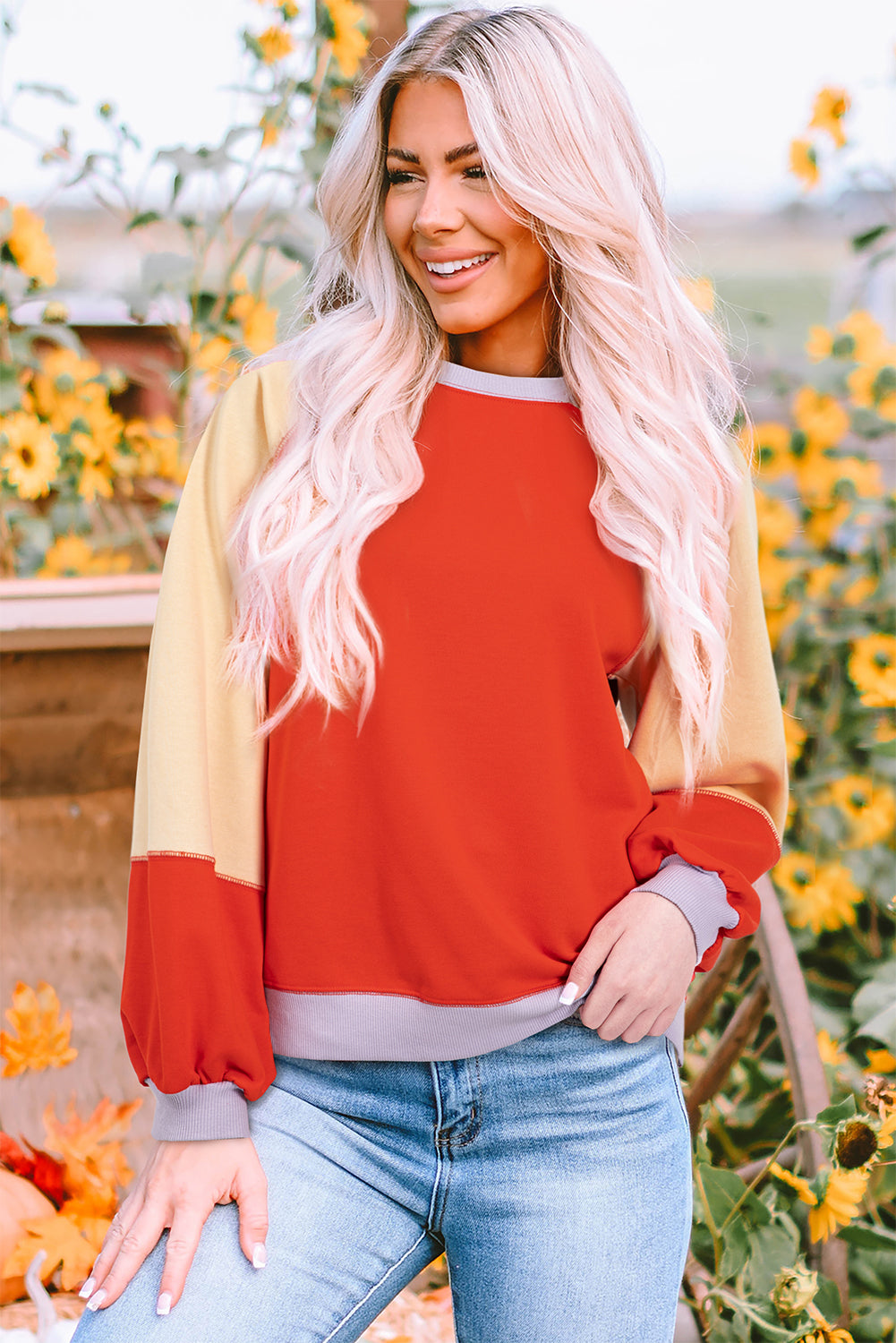 Orangefarbene Farbblockseite schlägt Raglan -Ärmel lous Fit Top