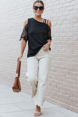 Black top with bare shoulders and lace straps