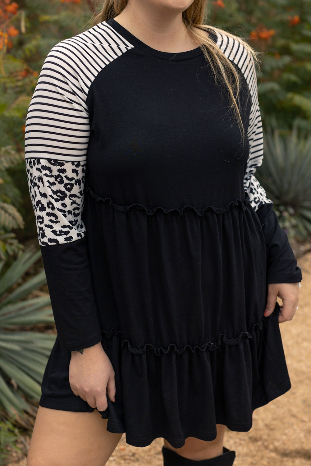 Striped black dress with ruffles and large leopard patch patch sleeves