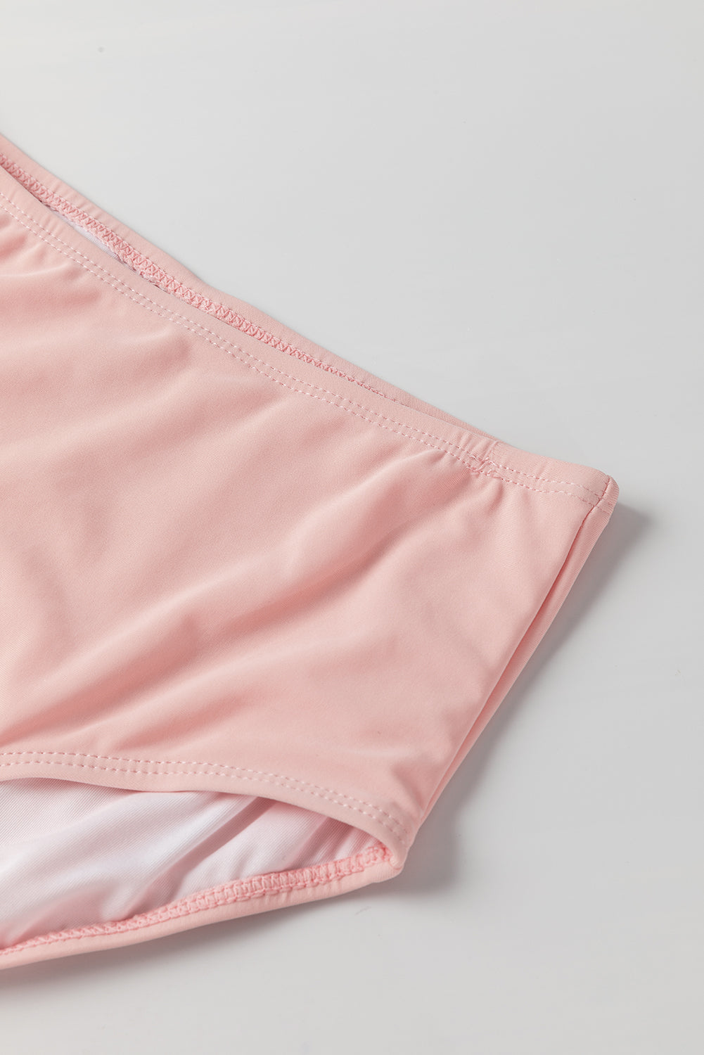 Maillot de bain tankini rose à rayures et ourlet noué en maille