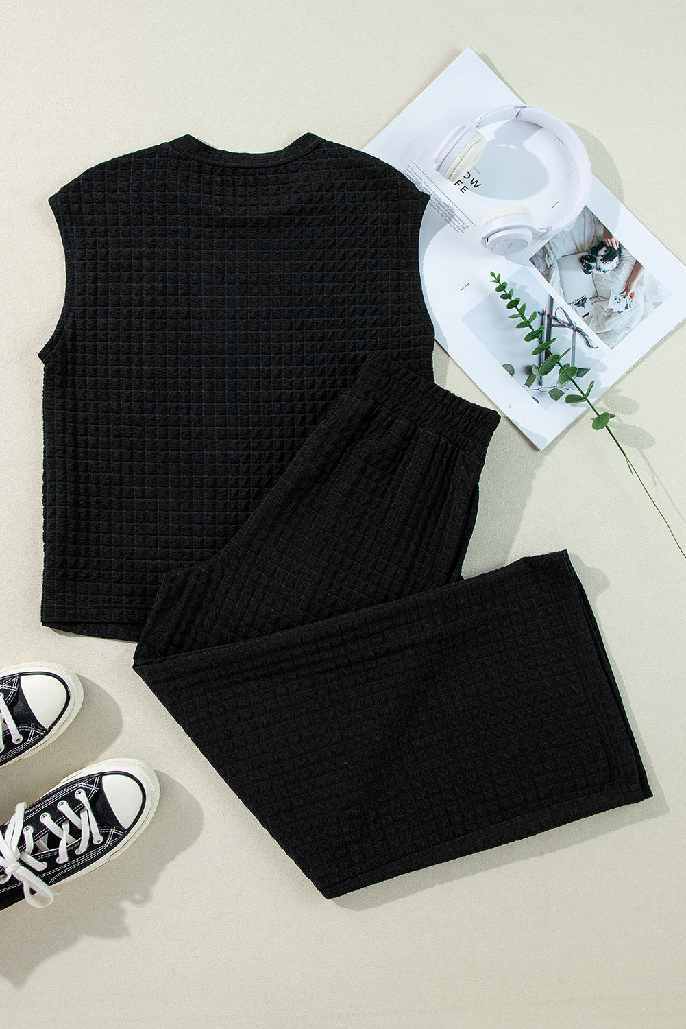 Black textured knit short sleeve t-shirt and wide leg pants set