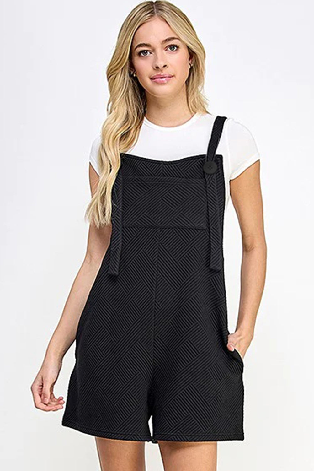 Black textured romper with adjustable straps