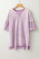 Surprised t-shirt with drooping shoulders and visible seams with mineral washed out and orchid petals