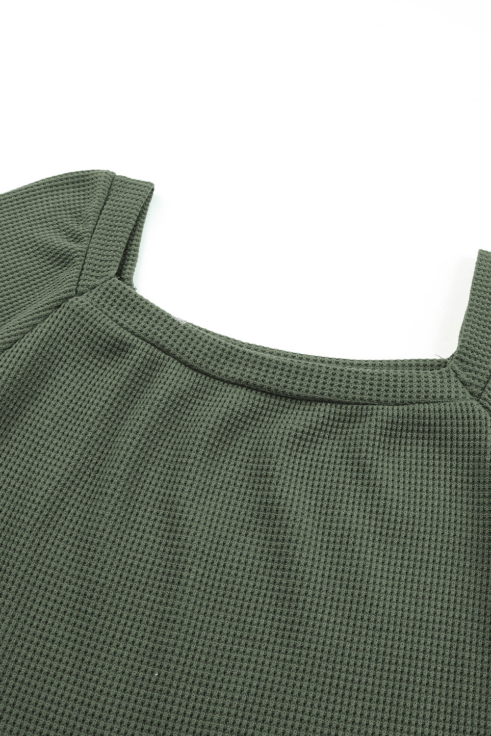 Haut en tricot gaufré vert à col rond et manches bouffantes