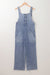 Large overalls in a washed-out denim blue stone with half-boutons and pocket pocket