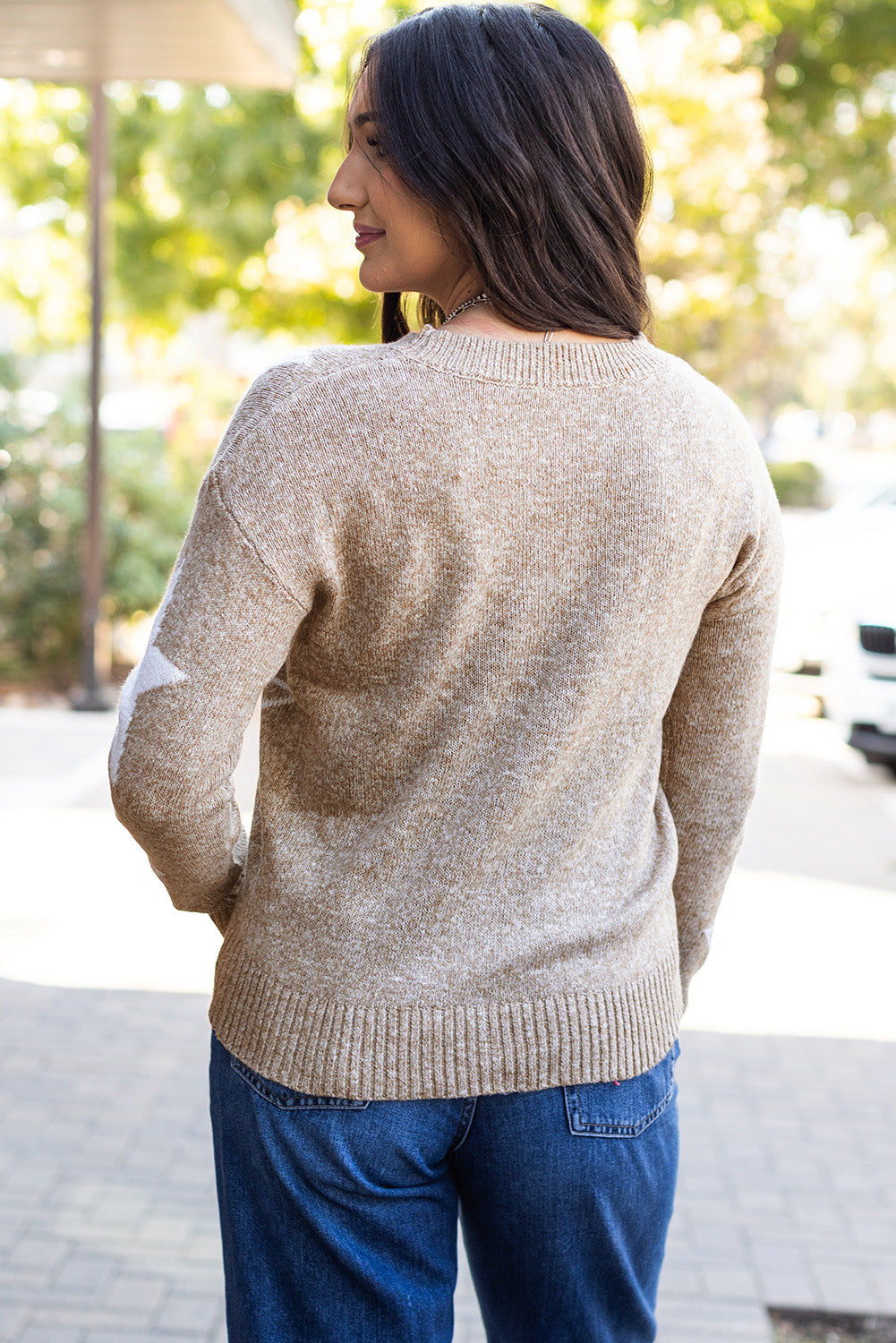 Pull kaki à épaules tombantes et motif étoiles