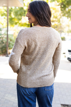 Khaki sweater with drooping shoulders and star pattern