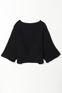 Dolman Pull in black ribbed knitting with exposed seams