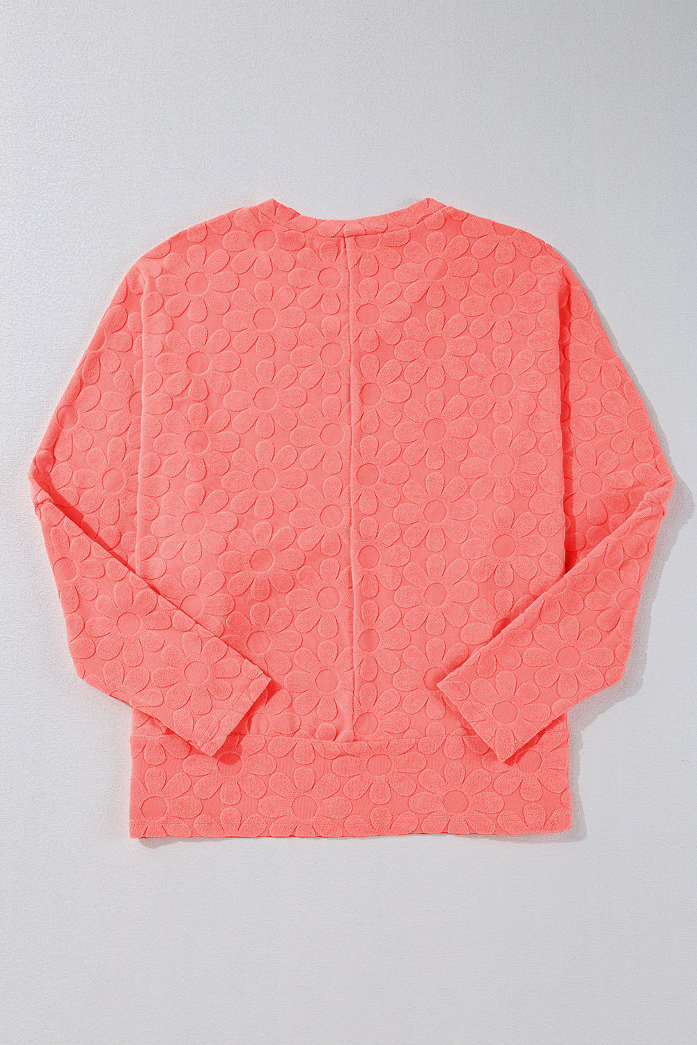 Haut à manches longues et col en V en jacquard floral surdimensionné rose abricot