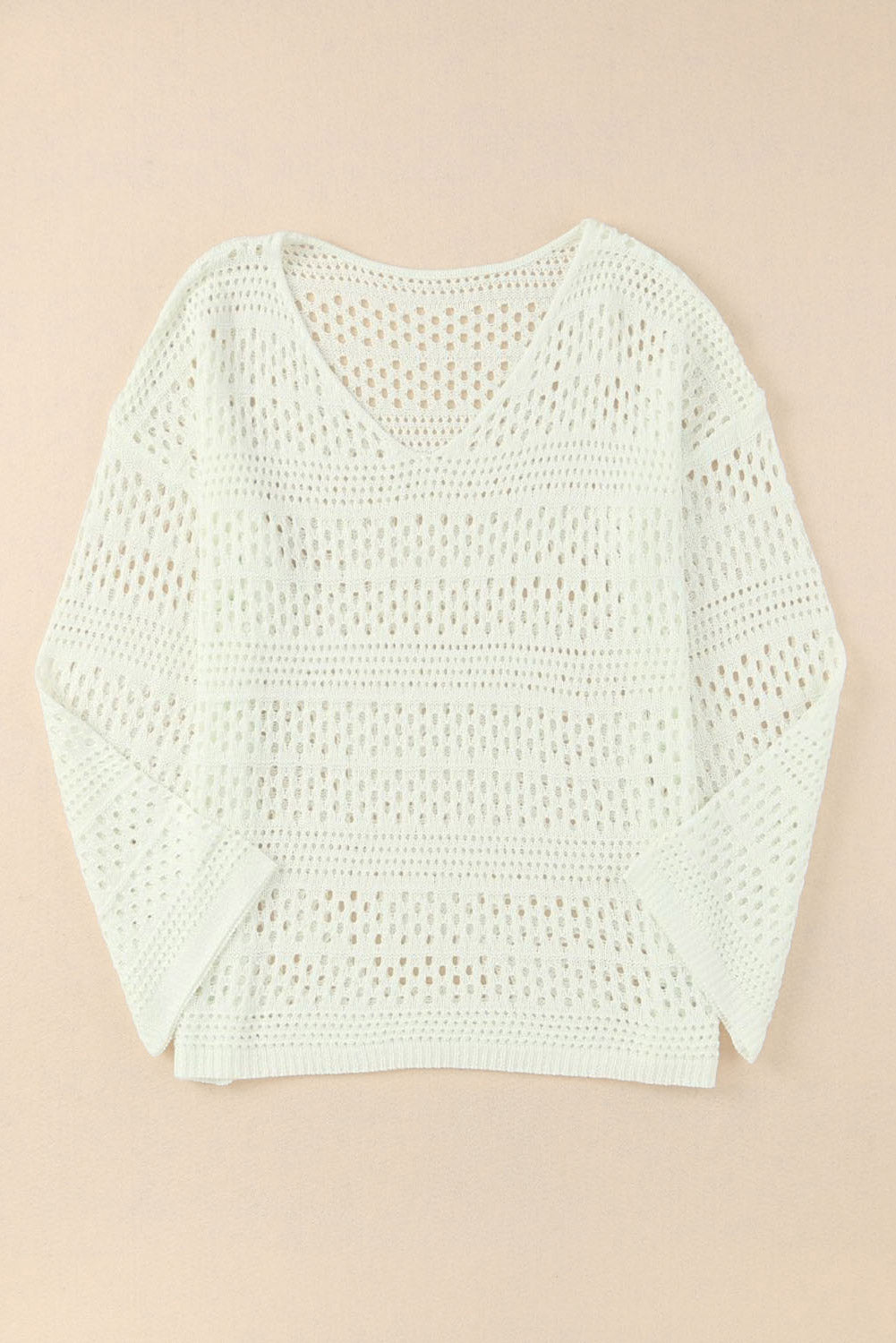 Pull blanc à col en V et crochet ajouré