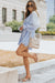 Sky Blue V-Neck Pleated Romper with Ruffles and Buttons at the Waist