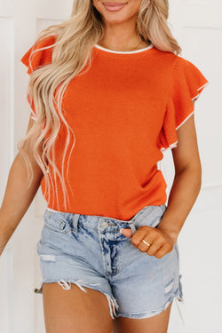 Knitted top with ruffled sleeves and contrasting trim in russet orange