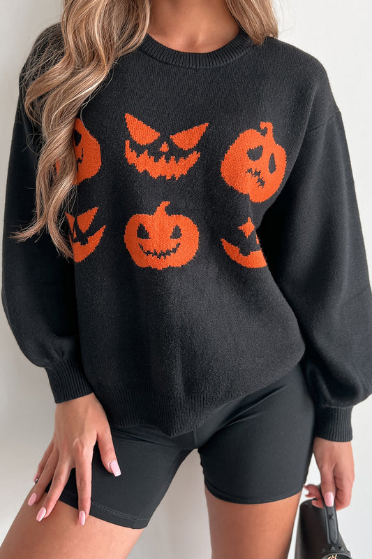 Pull noir à épaules tombantes et motif de visage de citrouille d'Halloween