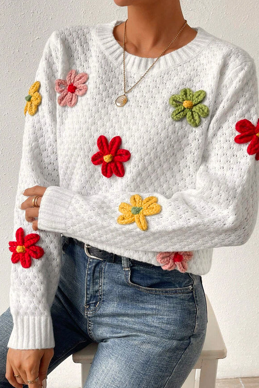 Textured knit sweater with white colorful flower appliques