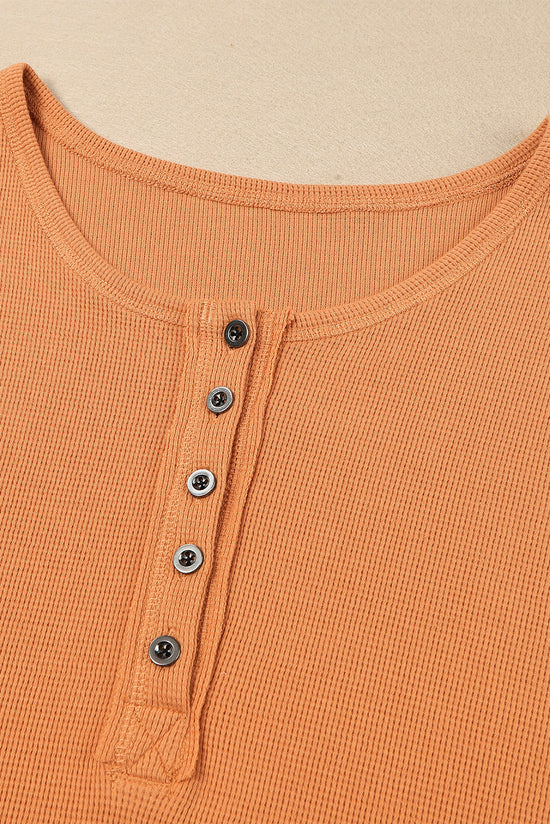 Haut Henley en naranja tejido en relieve