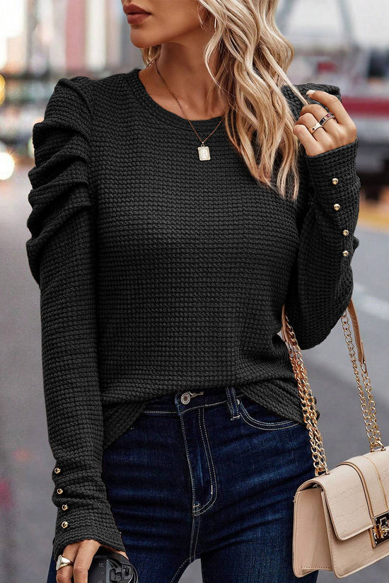 Black textured solid color buttoned mutton sleeve top