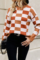Pull orange à carreaux et bords côtelés *